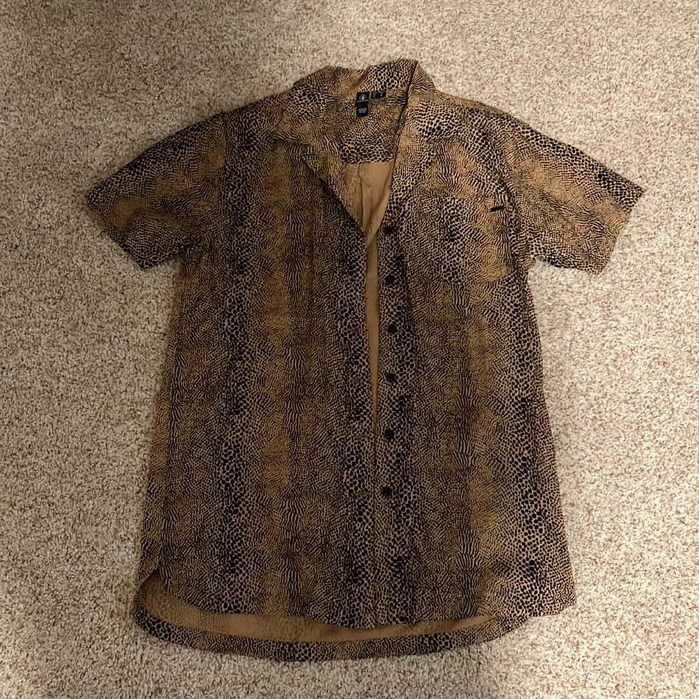 Volcom mini dress or swimsuit cover up. Barely used or worn. Great condition.